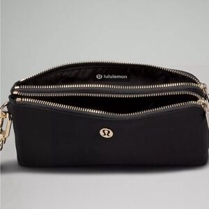 Lululemon Curved Wristlet Black & Gold